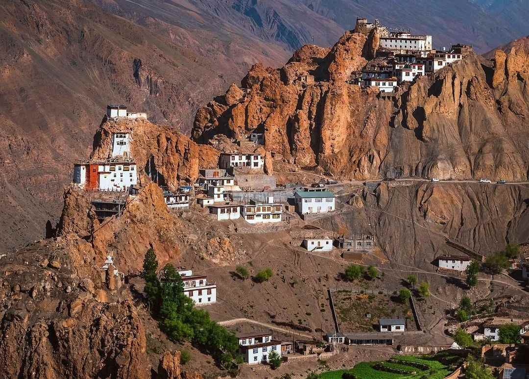 Spiti Valley in April May with snow-covered mountains and blue sky during spring road trip
