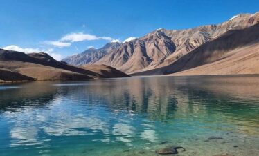 Chandratal Lake high-altitude camping tour in Himachal Pradesh with stunning Himalayan mountain views