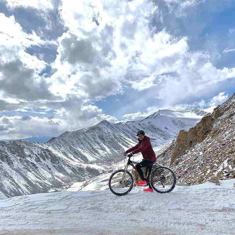 Adventure cycling in Leh Ladakh across scenic Himalayan roads and high-altitude landscapes.