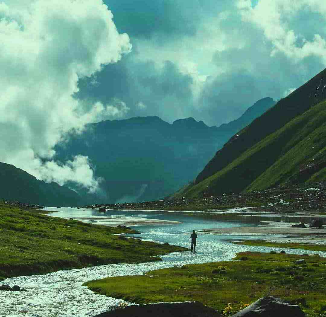 Hampta Pass Trek with dramatic mountain landscapes and high-altitude pass views.
