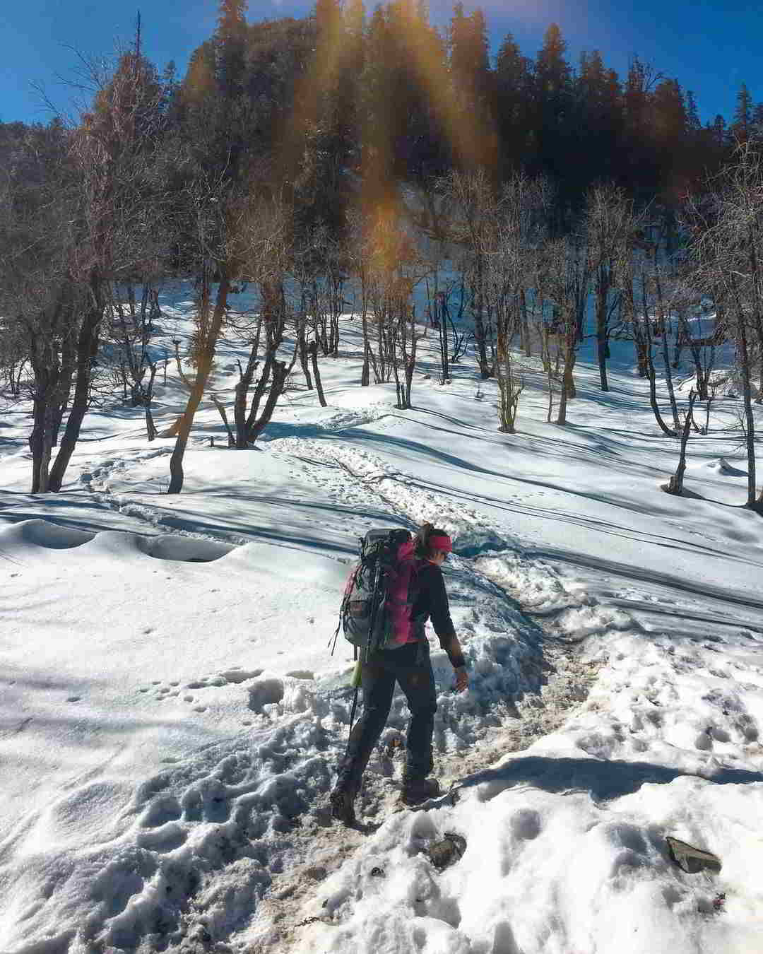 Kedarkantha Trek with snow covered trails and panoramic Himalayan mountain views.